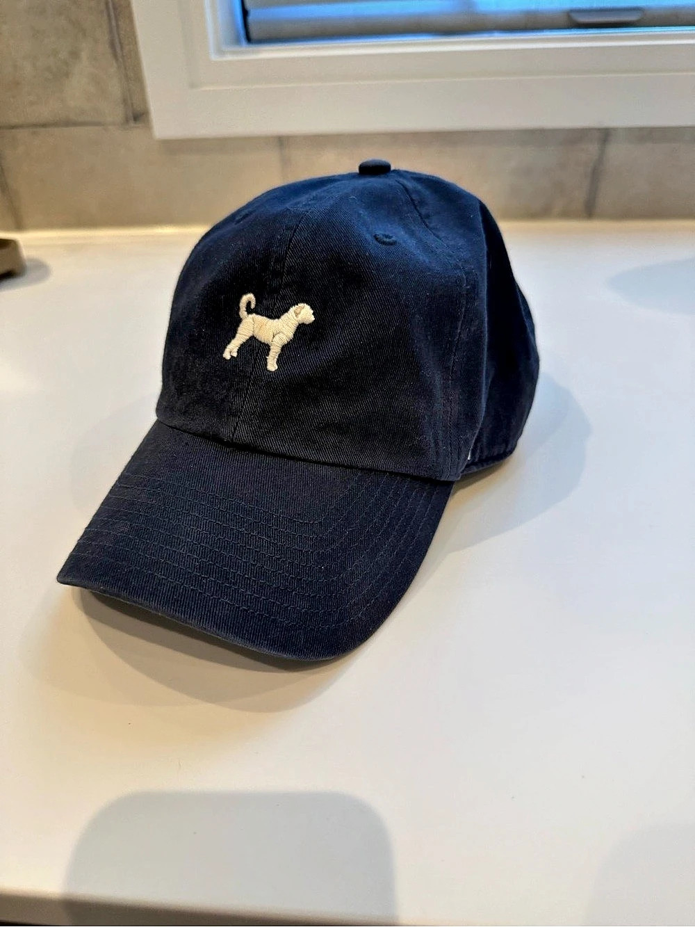 47 Clean Up Navy Adjustable Cap with white embroidered dog